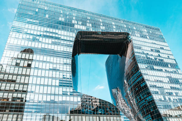 Modern, uniquely designed building in Dubai showcasing the city's innovative real estate investments.